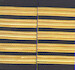Set of two 5 gold bar Epaulettes with black background. ( 13 mm bar) 